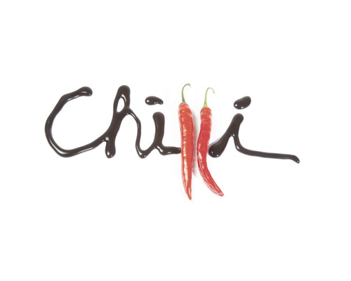 Chili-opschrift met twee chilipepers