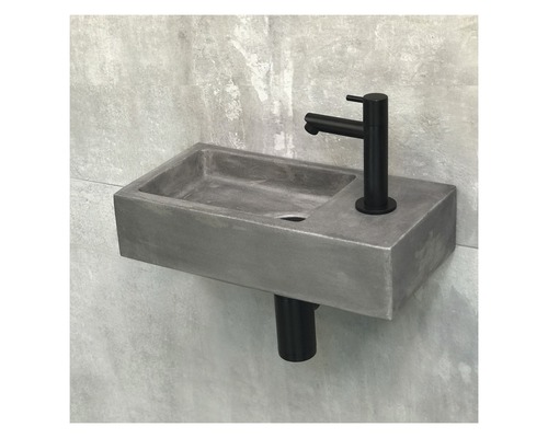Betonnen opzetwastafel met kraan