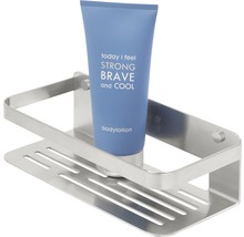 Doucheplank van metaal met bodylotion
