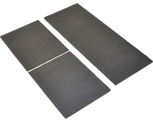 Vier zwarte rubberen platen