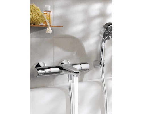 Opbouw badkraan met handdoucheset op badrand