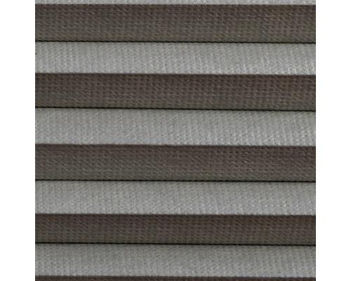 Close-up van een beige plisségordijn voor raamdecoratie