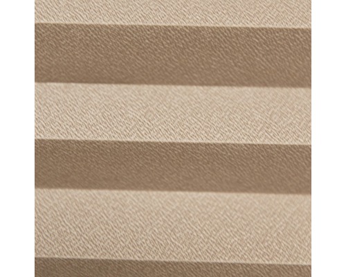Detailopname van een beige plisségordijn