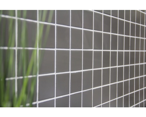 Close-up van een grijs mozaïek met voegen