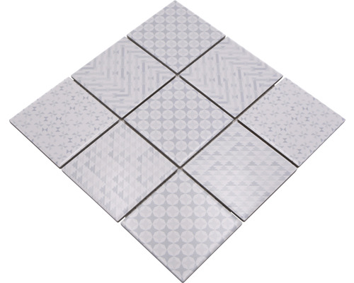 Patroon van negen vierkante tegels met verschillende geometrische ontwerpen