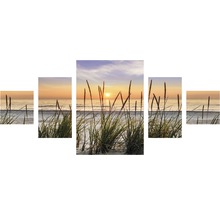Meerluik wanddecoratie met strandmotief en grassen op de voorgrond
