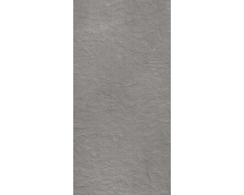 Grijze muur met pleisterstructuur