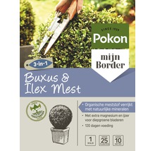 Pokon Buxus en Ilex meststof verpakking met snoeischaar in gebruik