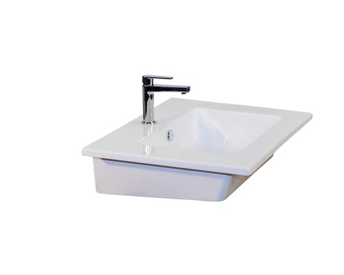 Wastafel van keramiek met kraan