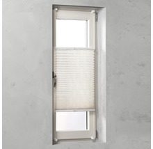 Plissé jaloezie op het raam voor lichtregulering en privacy.