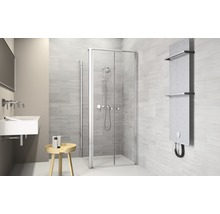 Moderne badkamer met douchecabine, wastafel en radiator