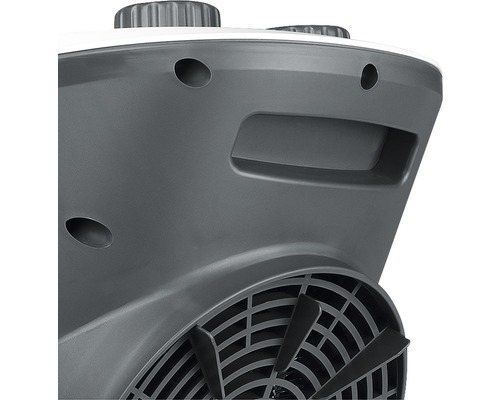 Detailopname van een kachel met handgreep en ventilator