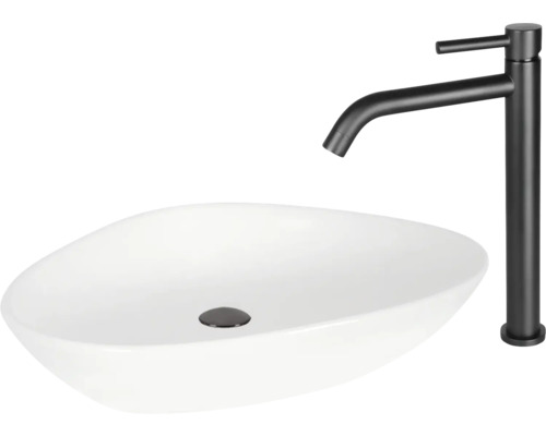 Wastafel van keramiek met kraan