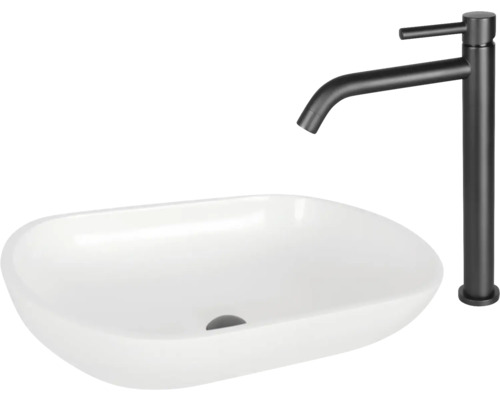 Wastafel van keramiek met kraan