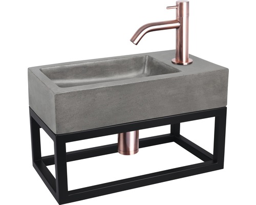 Wastafel met betonnen waskom, kraan en metalen frame