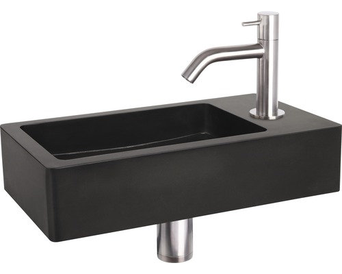 Zwarte opzetwastafel met kraan