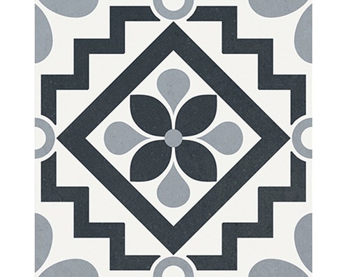 Decoratieve vloertegel met bloemmotief en geometrische elementen