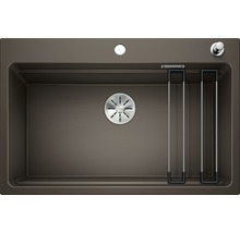 Bruine gootsteen met zeefkorfventiel en zeepdispenser