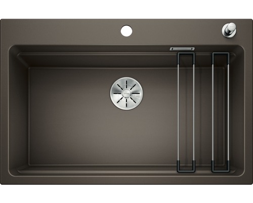 Bruine gootsteen met zeefkorfventiel en zeepdispenser