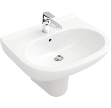 Witte keramische wastafel met kraan