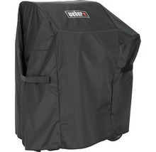 Weber logo op een barbecuehoes ter bescherming van een Weber barbecue