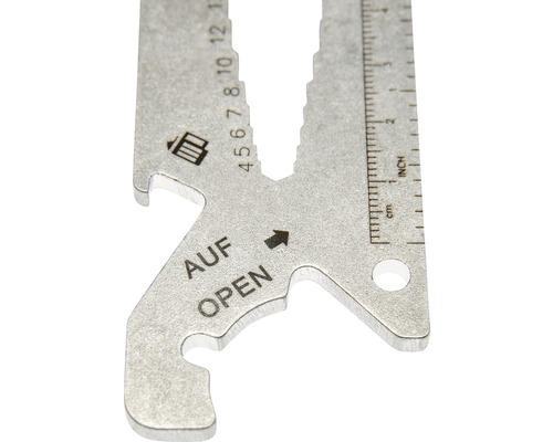 Detailopname van een multifunctioneel gereedschap met meetschaal en opener