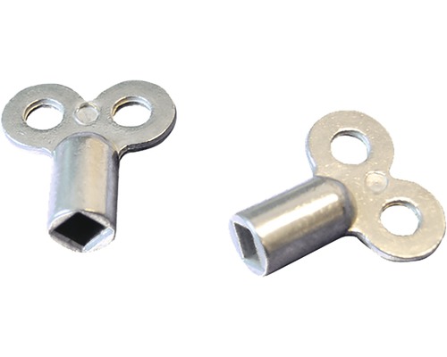 Twee metalen sleutels voor opwindbaar speelgoed