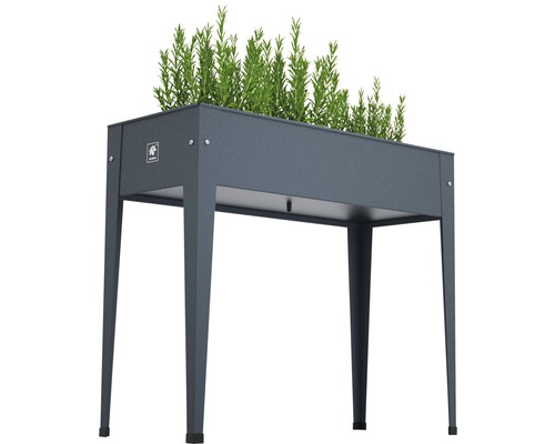 Metalen plantenbak op poten met planten