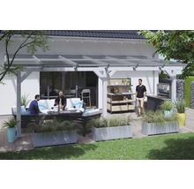 Overdekt terras met zithoek, barbecue en buitenkeuken