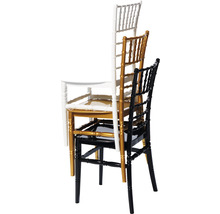 Stapelbare stoelen voor evenementen in zwart, goud en wit