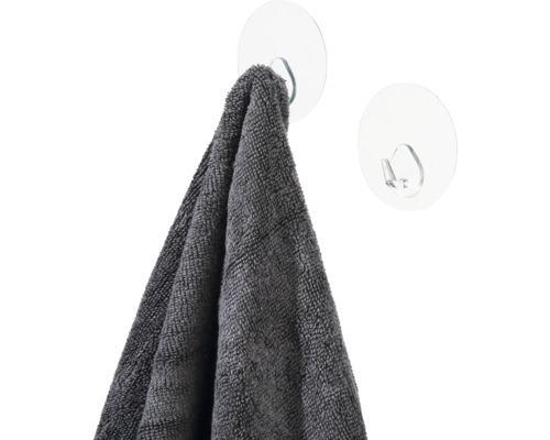 Grijze handdoek aan transparante zuignap haak