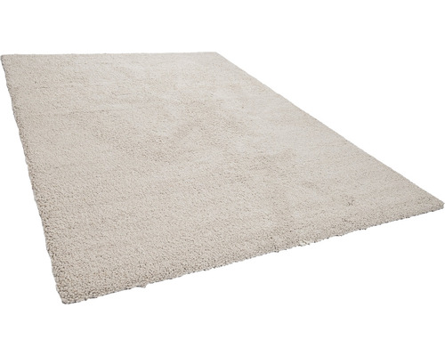 Beige hoogpolig tapijt