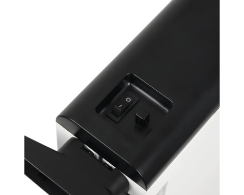 Close-up van een warmtestraler met schakelaar