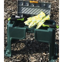Tuinbank met gereedschap en tuinhandschoenen