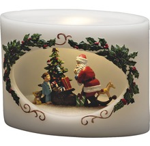 Decoratieve ledkaars met kerstman, kerstboom, kind en geschenken als feestelijke decoratie.