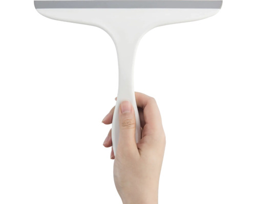 Hand houdt een trekker met handgreep vast