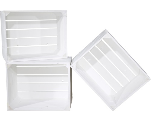 Drie witte houten kisten gestapeld