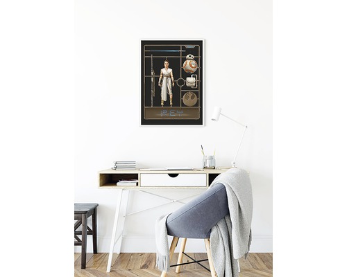 Ingelijste Star Wars wanddecoratie met Rey, BB-8 en lichtzwaard boven een bureau