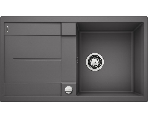 Grijze spoelbak met afdruiprek en afvoergarnituur