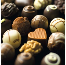 Diverse chocolaatjes met verschillende vormen en decoraties