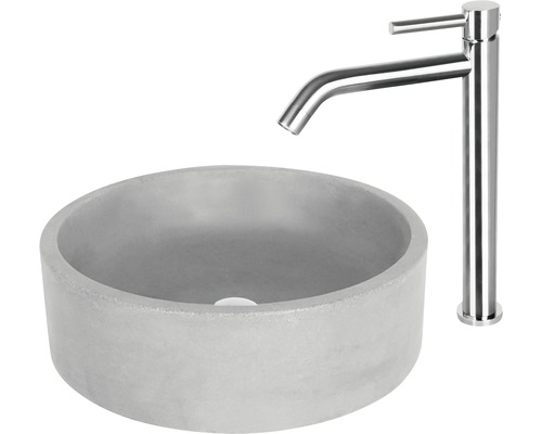 Ronde opzetwastafel van beton met kraan