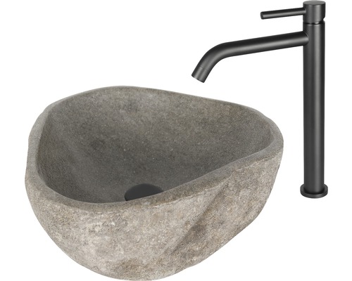 Wastafel van steen met kraan