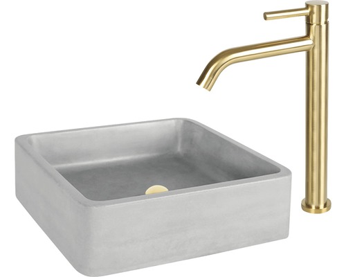 Vierkante betonnen opzetwastafel met gouden kraan