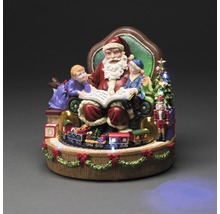Kerstdecoratie met kerstman, kinderen, notenkraker en trein