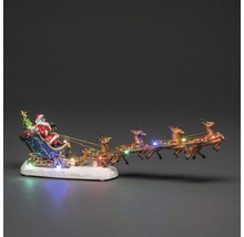 Kerstdecoratiefiguur met kerstman in slee en rendieren met verlichting