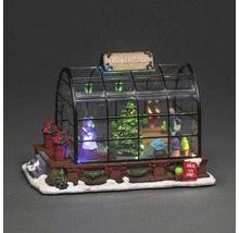 Decoratieve bloemenwinkelminiatuur met figuren en kas
