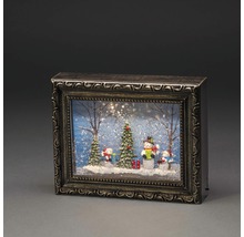 Decoratieve kerstornament met sneeuwman scène in een fotolijst