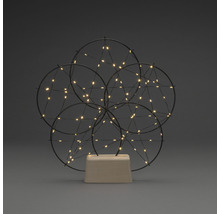 Decoratieve lamp met cirkelvormig ontwerp en ledlampjes op houten voet