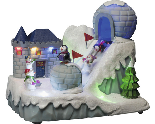 Decoratief winterlandschap met kasteel, iglo, pinguïns, sneeuwpoppen en skiërs