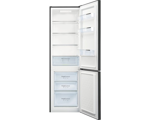 Geopende koelkast met planken en laden